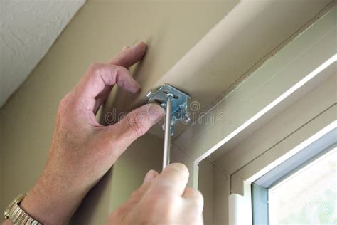 Installing Blinds stock photo. Image of renovation, hardware - 19433544