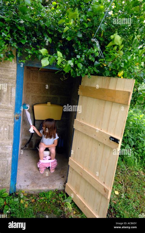 Toilet, Outside toilet, girl using an outdoor toilet Stock Photo, Royalty Free Image: 13101254 ...