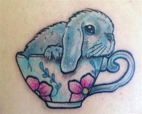 http://tattoomagz.com/rabbits-tattoos-on-bodies/blue-cup-and-rabbit-tattoo-on-body/ New tattoo ...