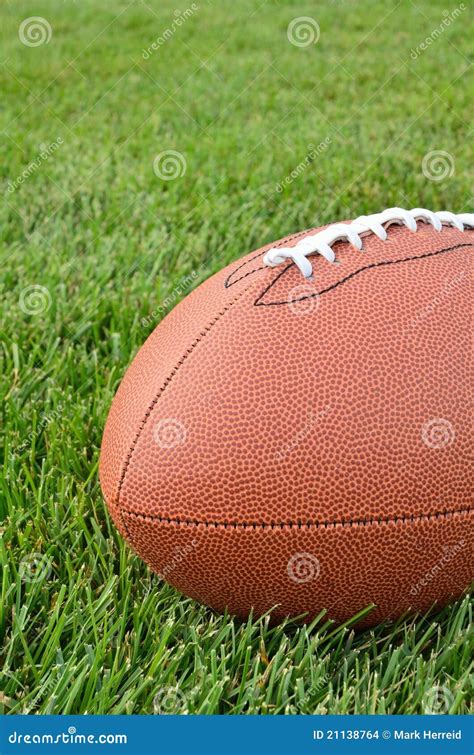 Close-up of an American Football on Grass Field Stock Photo - Image of closeup, space: 21138764