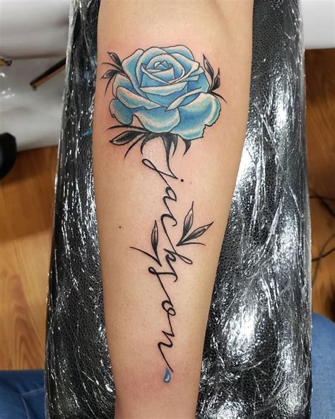 blue rose tattoo with name - Janette Tubbs