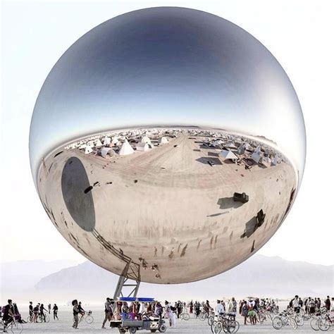 This giant reflective sphere designed by Bjarke Ingels and Jakob Lange ...