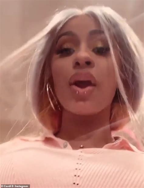 Cardi B reveals unusual new lip and NECK piercings | Daily Mail Online