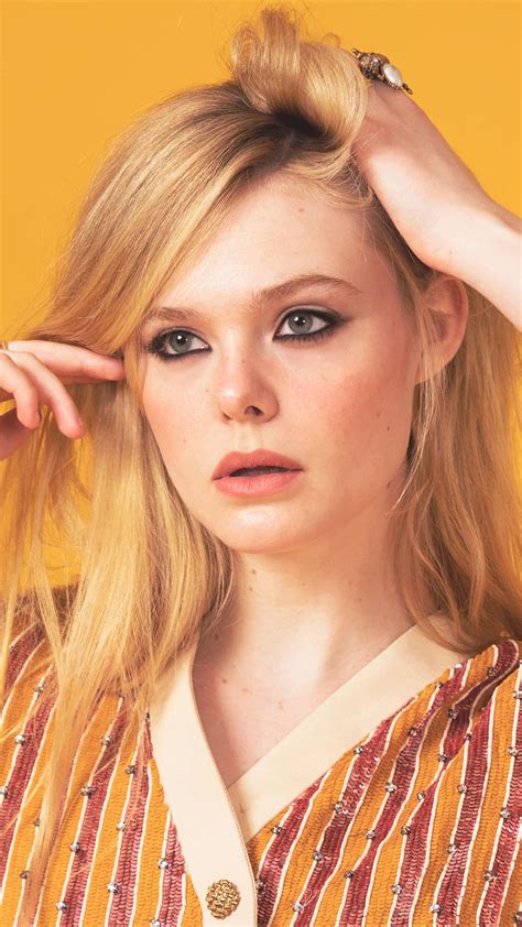 Elle Fanning 2021 Photoshoot Yellow Background 4K Ultra HD Mobile Wallpaper