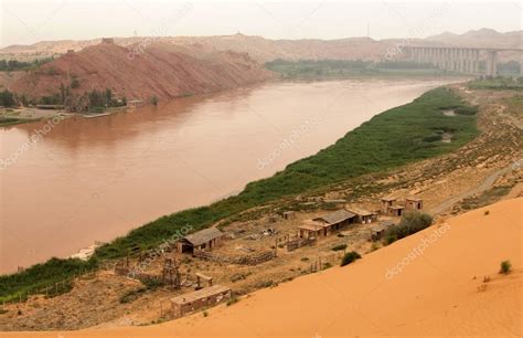 Yellow River (Huang He) - amazing landscape in Shapotou, China Stock Photo by ©katoosha 125168516