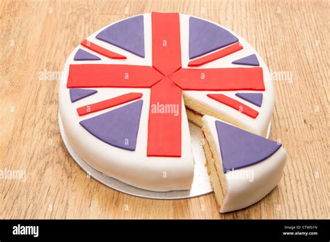 Victoria sponge cake with UK flag icing decoration - studio shot Stock Photo - Alamy