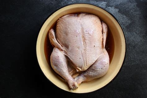 Premium Photo | Raw chicken in marinade for baking or barbecue grill