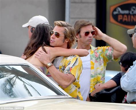 Brad Pitt hugs it out with Margaret Qualley, 23, as they bond on the ...