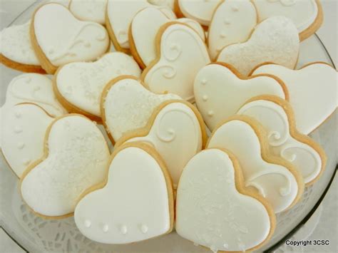 Mini fancy heart hand decorated sugar cookies for weddings, showers, birthdays and other events ...