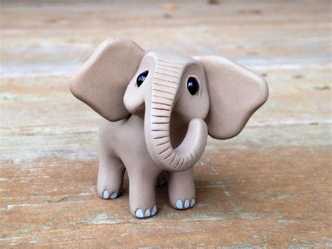 Elephant: Handmade miniature polymer clay animal figure | Polymer clay crafts, Polymer clay ...