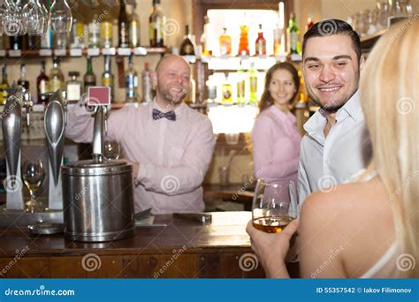 Bartender Entertaining Guests Stock Photo - Image of caucasian, lifestyle: 55357542