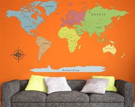 an orange wall with a world map on it