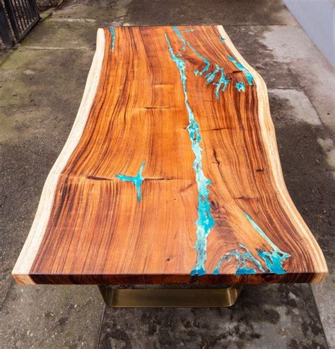a wooden table with blue paint on it