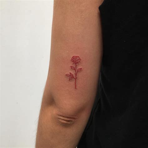 Red rose tattoo by Philipp Eid - Tattoogrid.net