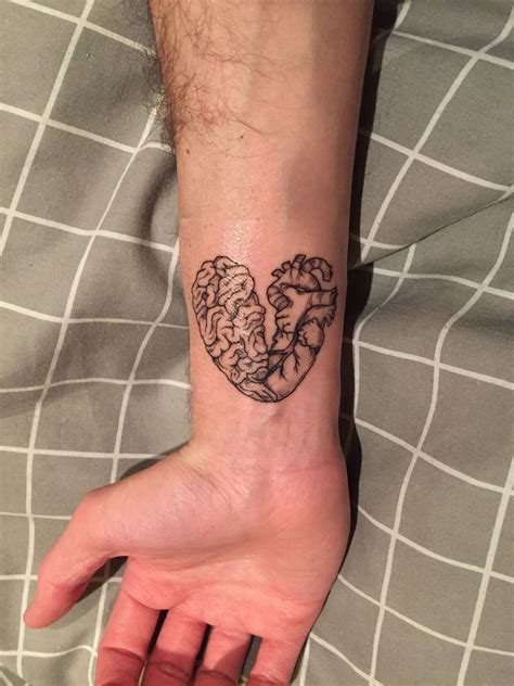 Broken anatomical heart & brain tattoo | Brain tattoo, Broken heart tattoo, Heart flower tattoo