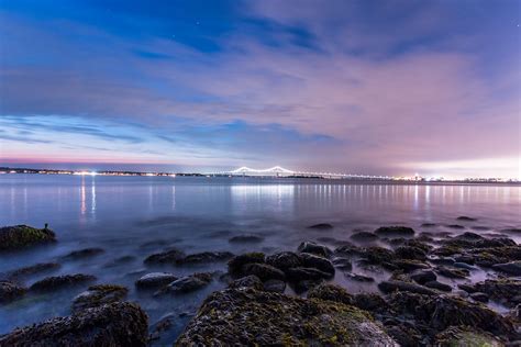 Newport Bridge at night. Watch the amazing sky an the old stones in the water! [5472 x 3648] [OC ...