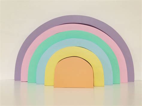 Encourage learning and play with wooden educational toys like this gorgeous pastel-coloured ...