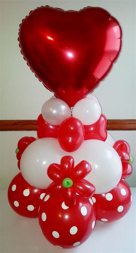 #Valentines Day Ideas: Heart centerpiece embellished with flowers. | Valentines balloons ...