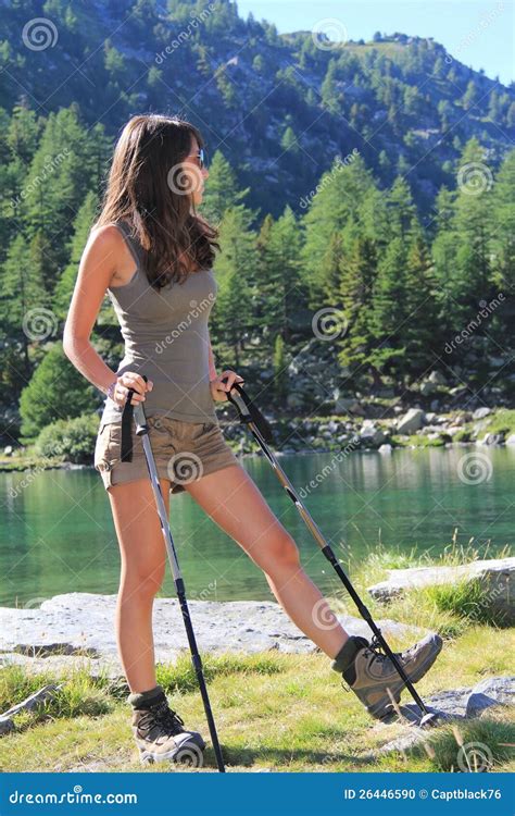 Hiking Girl Looks at Green Mountain Lake Stock Photo - Image of nature, stone: 26446590