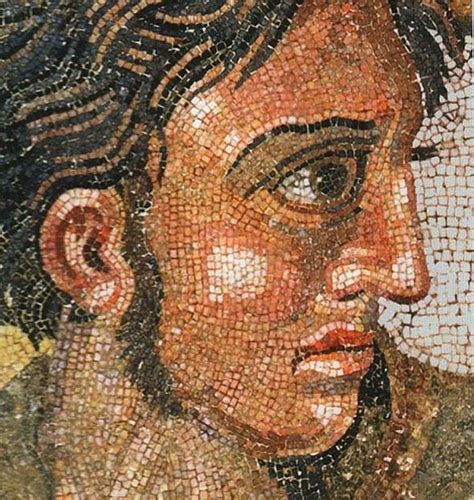 a close up of a mosaic with a man's face and hair on it