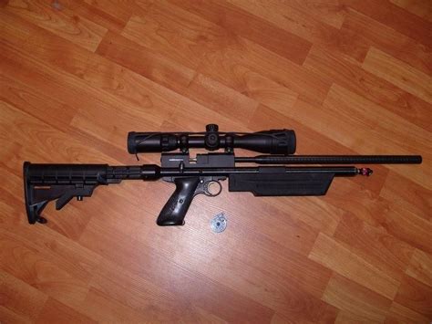 A Crosman 2240 custom with an interesting front "tactical" stock. Survival Weapons, Survival ...