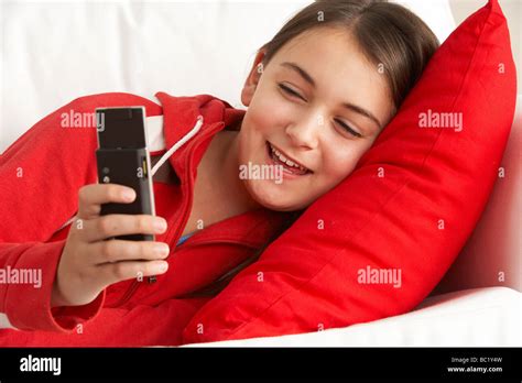 Young Girl Reading Text Message Stock Photo - Alamy