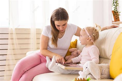 Girl With Cochlear Implant And Mother At Home Deaf Community Concept Photo Background And ...