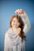 Woman Holding Heart