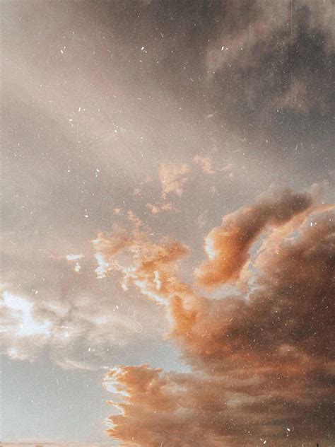 Download Aesthetic Beige Cloudy Sky Wallpaper | Wallpapers.com