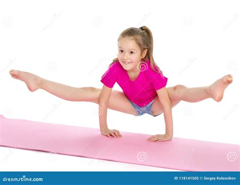 The Gymnast Perform an Acrobatic Element on the Floor. Stock Image ...