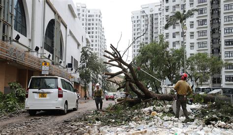 Clean up begins for Hong Kong residents after Typhoon Mangkhut wreaks ...