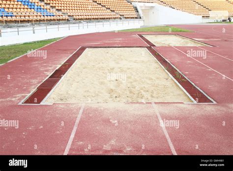 long jump pit Stock Photo - Alamy