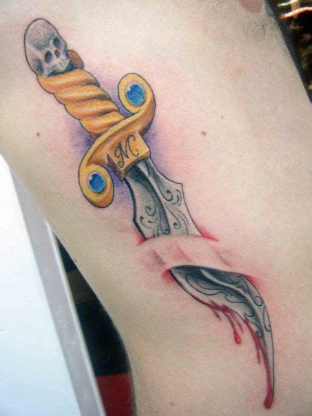 Blade in skin tattoo by DeadlyInk, via Flickr | Dagger tattoo, Tattoos ...