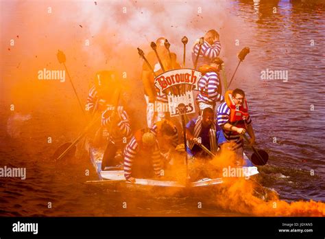 Lewes Bonfire Societies Take Part In The Annual 'Bonfire Dash' On The River Ouse, Lewes, Sussex ...