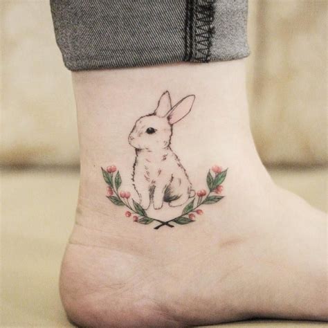 Cute small rabbit tattoo on ankle tattooist_ego | Bunny tattoos, Rabbit tattoos, Tattoos
