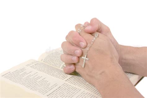 Praying Hands With Bible