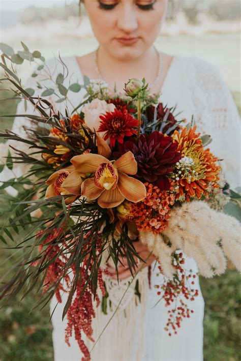 Boho Fall Wedding | Silk flowers wedding, Red bouquet wedding, Fall wedding flowers