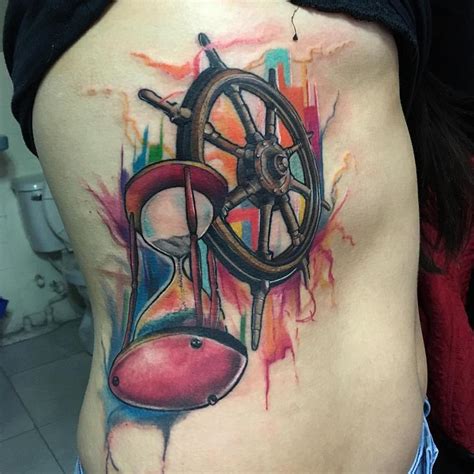 35 Awesome Wheel Back Tattoo Pictures