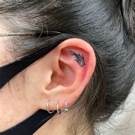 Inner Ear Tattoo Pain: How Bad Do They Hurt? - AuthorityTattoo