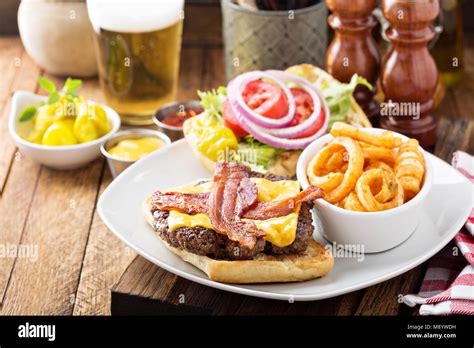 Traditional american burger with cheese and bacon Stock Photo - Alamy