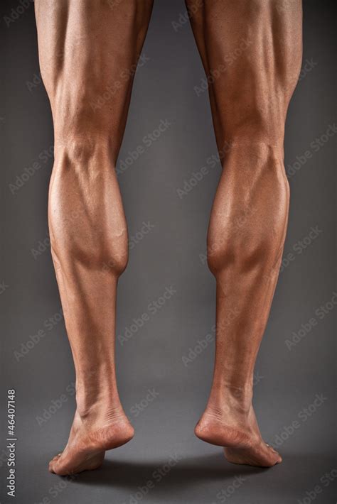 Muscular male legs Stock Photo | Adobe Stock