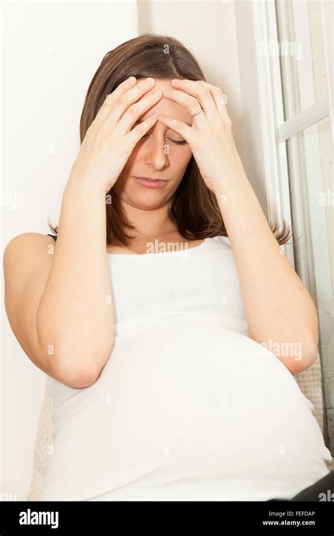 sad pregnant woman Stock Photo - Alamy