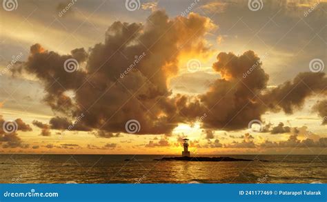 Sunset Over the Lighthouse in Orange Color. Stock Image - Image of ...