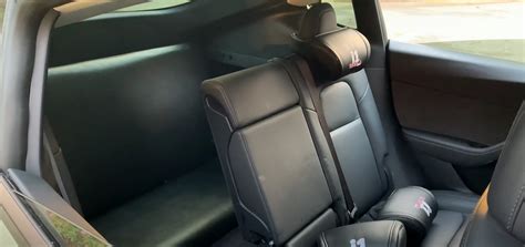 Tesla Model Y owner builds 7-seat option in DIY project