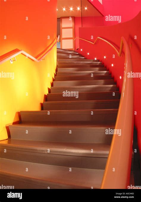 red interior of Groninger Museum with spiral staircase Groningen ...