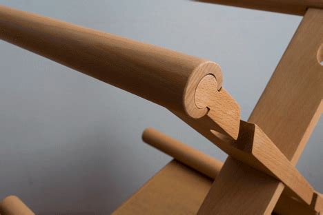 a close up of a wooden rocking chair
