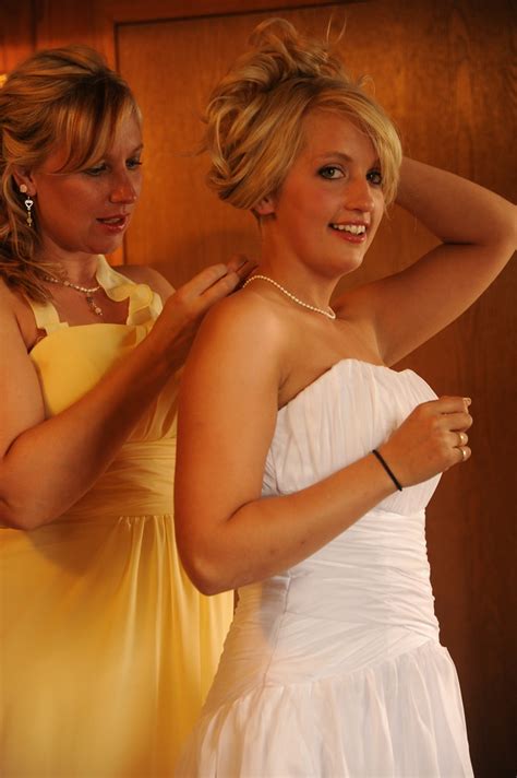 Assisted by Karina Huffaker, maid of honor in sunny yellow… | Flickr