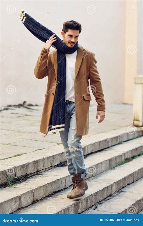 Young Man Wearing Winter Clothes in the Street. Stock Image - Image of autumn, person: 151861389