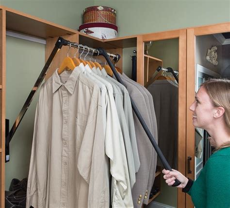 The Pull-Down Closet Rod helps make clothing accessible and expand storage space. It's easy t ...