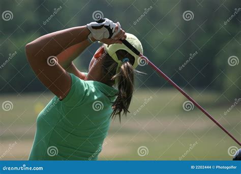 Lady golf swing stock photo. Image of green, evian, hitting - 2202444